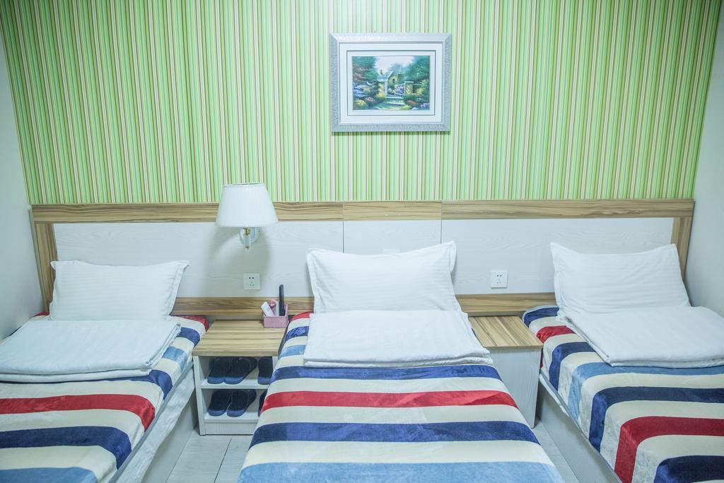 Qingdao Haibianke Hostel Habitación foto